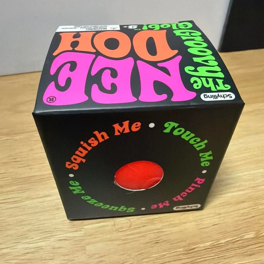 Authentic Schylling NeeDoh Groovy Glob Orange Squishy